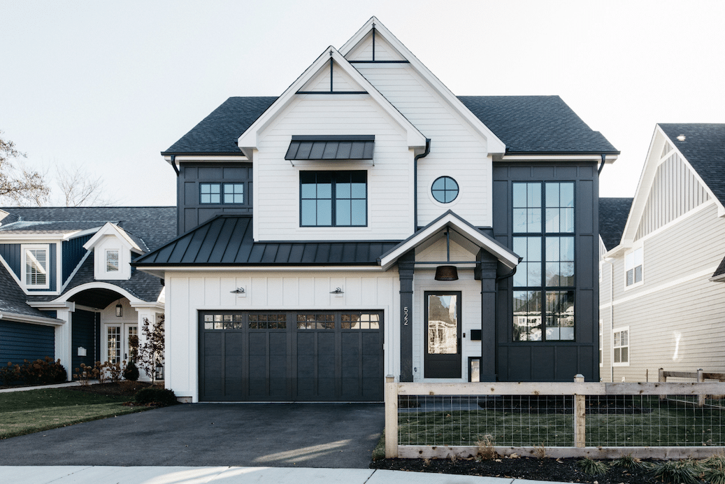 single story white house with black trim